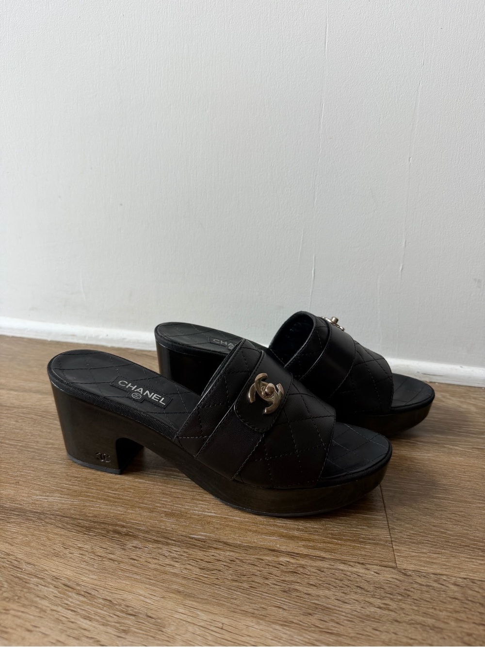 CHANEL Black Quilted Leather Slide Mules